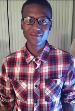 Elijah_McClain_with_checkered_shirt_and_glasses