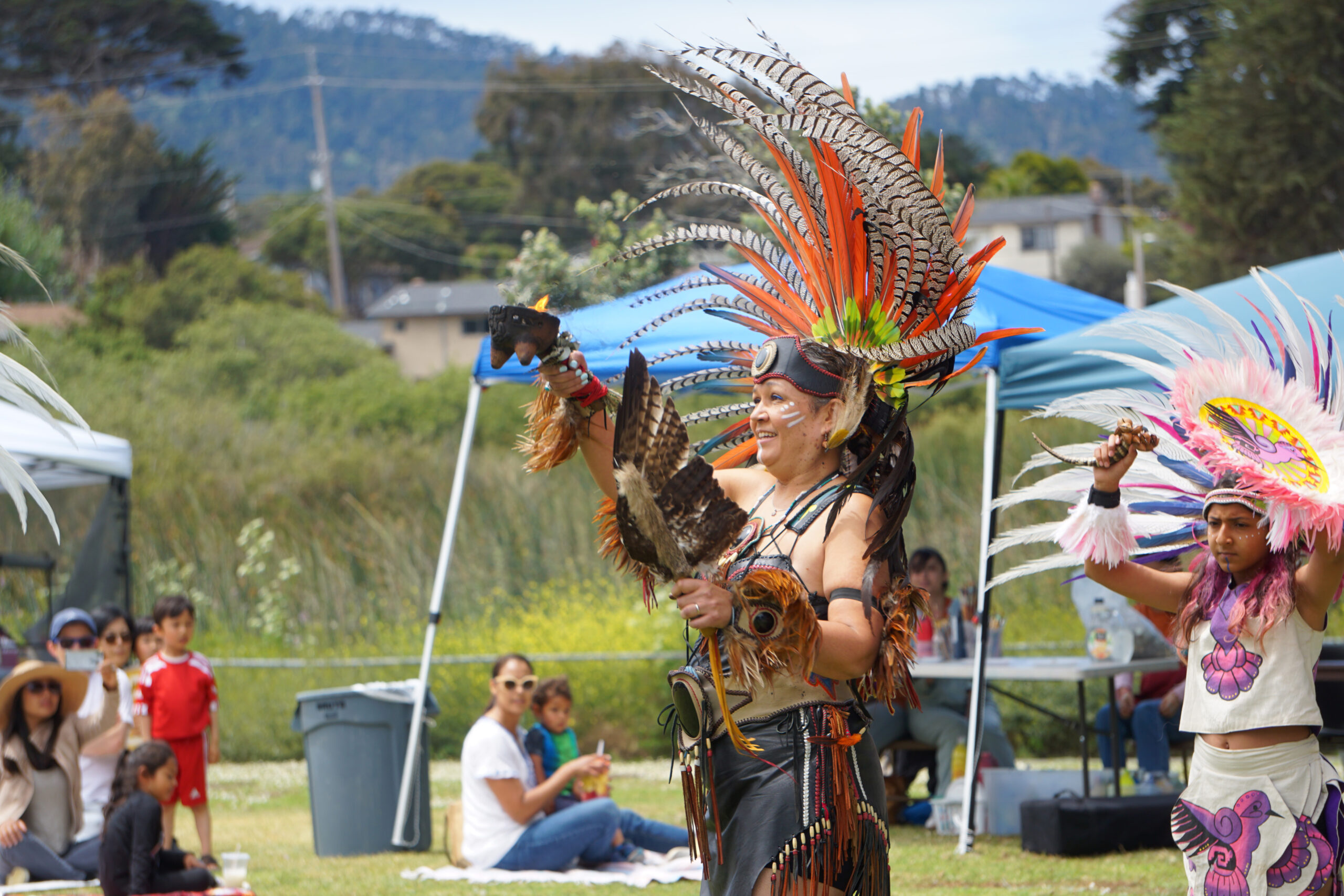 Aztec dance troupe Calpulli Tonalehqueh offers a blessing ceremony to honor the Ohlone/Esselen/Costanoan original inhabitants of the Monterey Peninsula during the 6th Annual Palenke Arts Festival at Laguna Grande Park in Seaside on June 5, 2022.